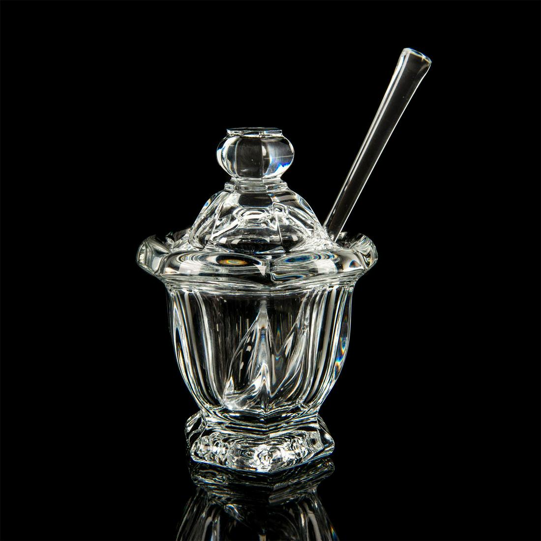 Baccarat Crystal, Harcourt Missouri Mustard Jar: Clear crystal lidded footed mustard jar with spoon. Baccarat's Missouri pattern. Curved sides with hexagonal bases, thick scalloped rims, topped with a round knob. Baccarat France backstamps. Issued: 