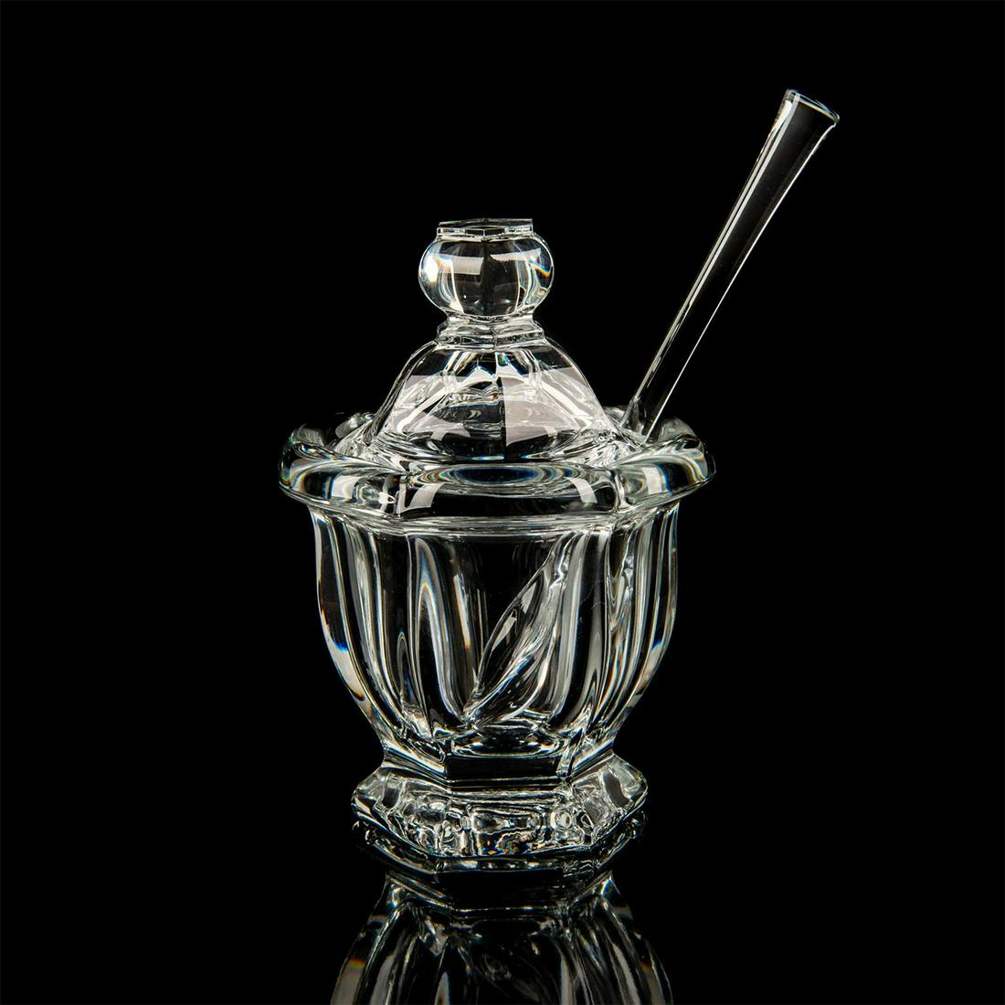 Baccarat Crystal, Harcourt Missouri Mustard Jar: Clear crystal lidded footed mustard jar with spoon. Baccarat's Missouri pattern. Curved sides with hexagonal bases, thick scalloped rims, topped with a round knob. Baccarat France backstamps. Issued: 