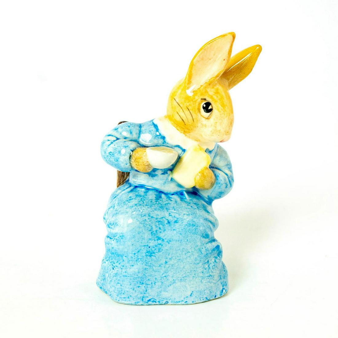 Cottontail - Royal Albert - Beatrix Potter Figurine: Royal Albert Backstamp. Blue dress, brown chair. Artist: David Lyttleton Issued: 1985 - 1996 Dimensions: 3.75''H Manufacturer: Beswick Country of Origin: England