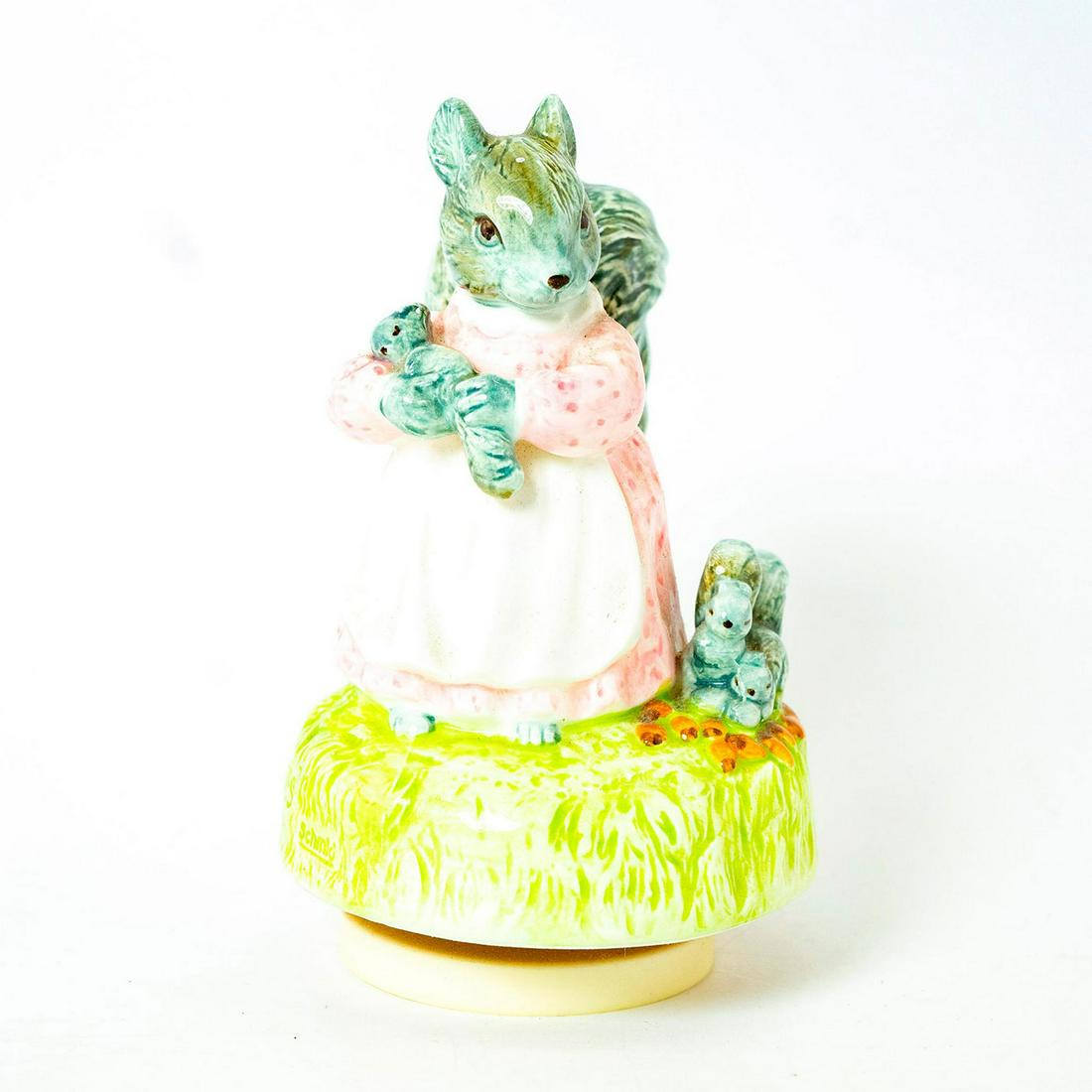 Schmid Music Box, Beatrix Potter, Goody Tiptoes: Group of squirrels sit atop grassy base that rotates and plays music. Schmid backstamp. Inscription on the side that reads 'Goody Tiptoes, Schmid, Beatrix Potter'. Issued: 1991 Dimensions: 7"H Manufac