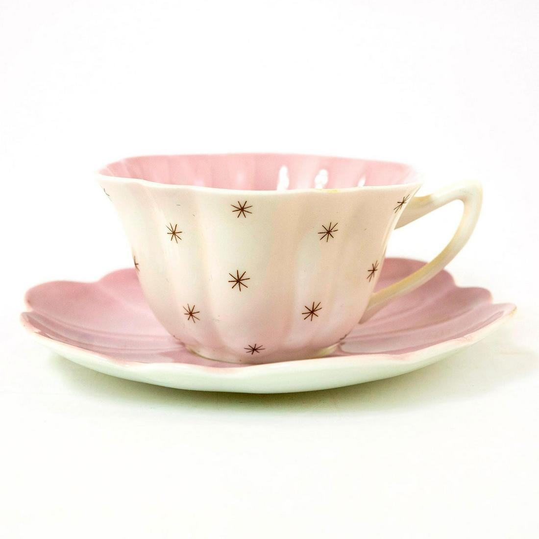 Shelley Fine Bone China Cup And Saucer, Pole Star,: Best Ware collection; Pole Star, pattern 13774. White glazed finished w. pale purple interior. Shelley backstamp. Marked Pole Star on the underside. Issued: 20th c. Dimensions: 5.5"W x 3"H Manufacture