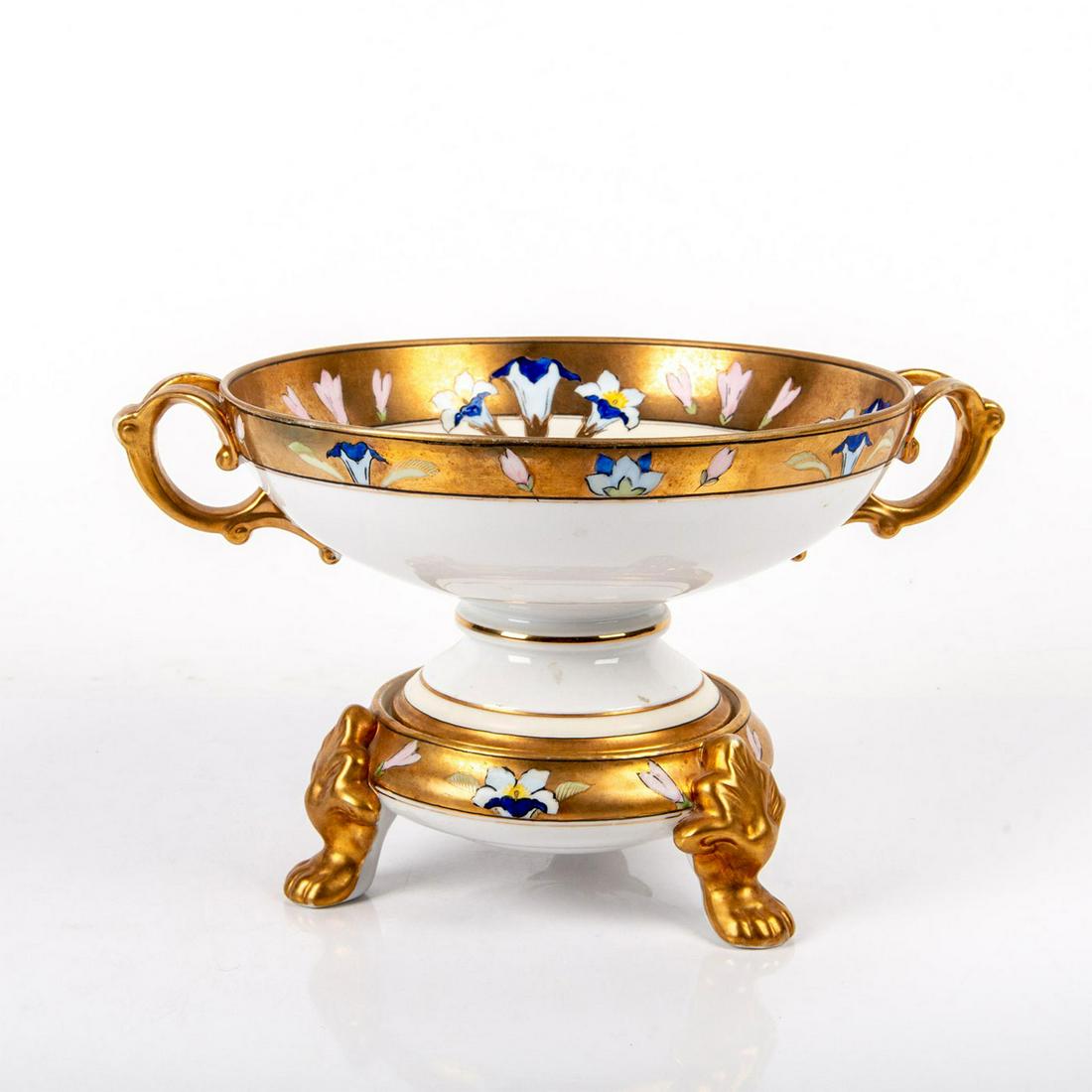 Noritake Punch Bowl with Stand,: A beautiful porcelain bowl with gold gilt decoration. Floral motif. Two handle bowl. Noritake backstamp. Issued: 19th c. Dimensions: 4.5"H x 9" dia. Manufacturer: Noritake Country of Origin: Japan