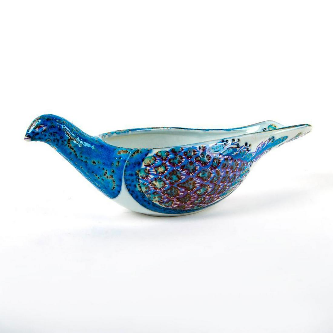 Aluminia Berte Jessen Faience Peacock Bowl: Figural nut or candy bowl in the form of a peacock; blue and purple coloration; feathering detail. Artist's monogram on base. Aluminia ( Royal Copenhagen) backstamp. Crazing to body. Artist: Berte Jes