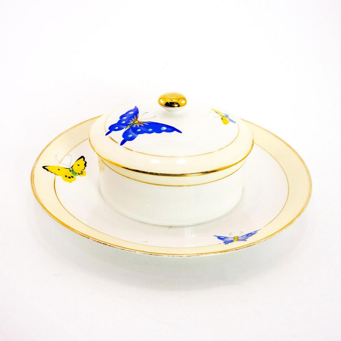 Unusual Nippon Lidded Serving Cheese Dish Butterfly: Porcelain plate with attached bowl; butterfly design. Gold gilt accents Nippon backstamp Issued: 19th c. Dimensions: 3"H x 8.5" dia. Manufacturer: Nippon Country of Origin: Japan