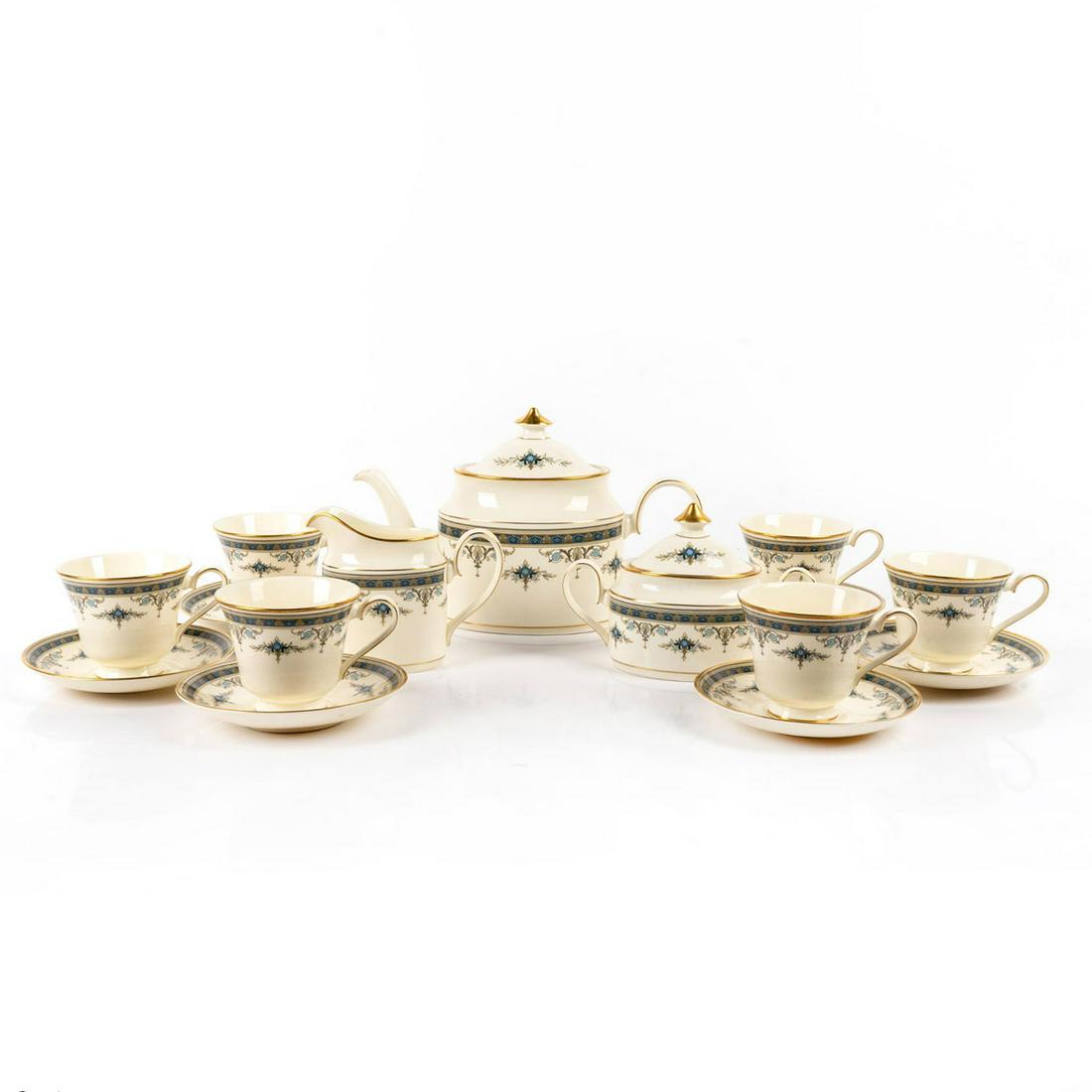 15 Piece Minton Tea Set, Grasmere: Bone China Set: Includes Tea Pot with lid, Creamer, Sugar bowl with lid. 6 cups and 6 saucers. Minton backstamp. Issued: 19th c. Dimensions: 11"L x 7"H Manufacturer: Minton Country of Origin: England