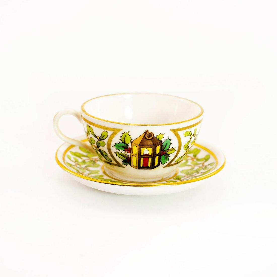 Spode Miniature Teacup and Saucer Lantern Design: An adorable mini set of teacup and saucer. Lantern with mistletoe. Spode backstamp Issued: 19th c. Dimensions: 1"H x 1.5" dia. Manufacturer: Spode Country of Origin: England
