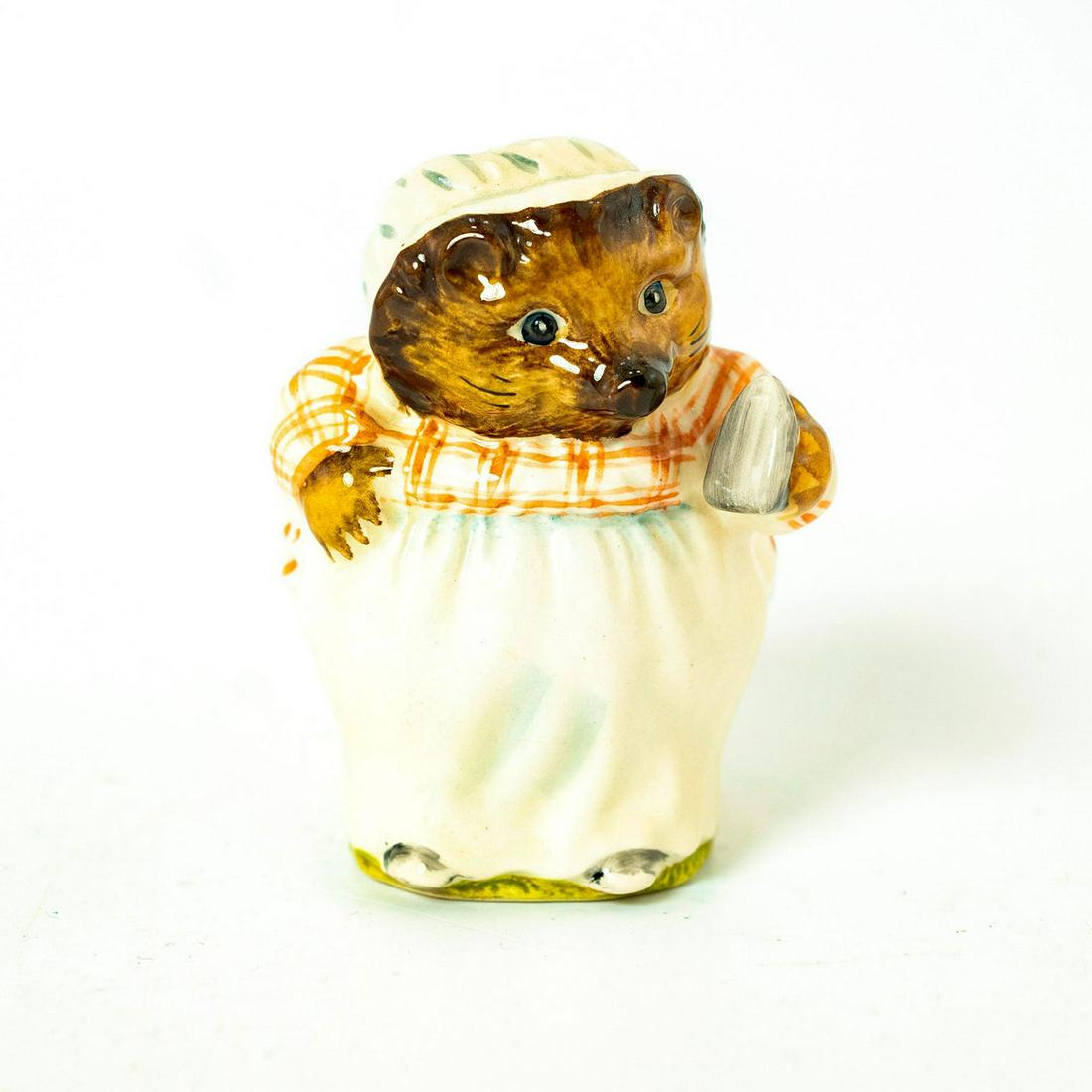 Mrs. Tiggy Winkle, Beswick, Beatrix Potter Figurine: Beswick Backstamp. Plaid striped red- brown and white dress, green and blue striped skirt, white apron. Artist: Arthur Gredington Issued: 1970 - 2000 Dimensions: 3.25''H Manufacturer: Beswick Country