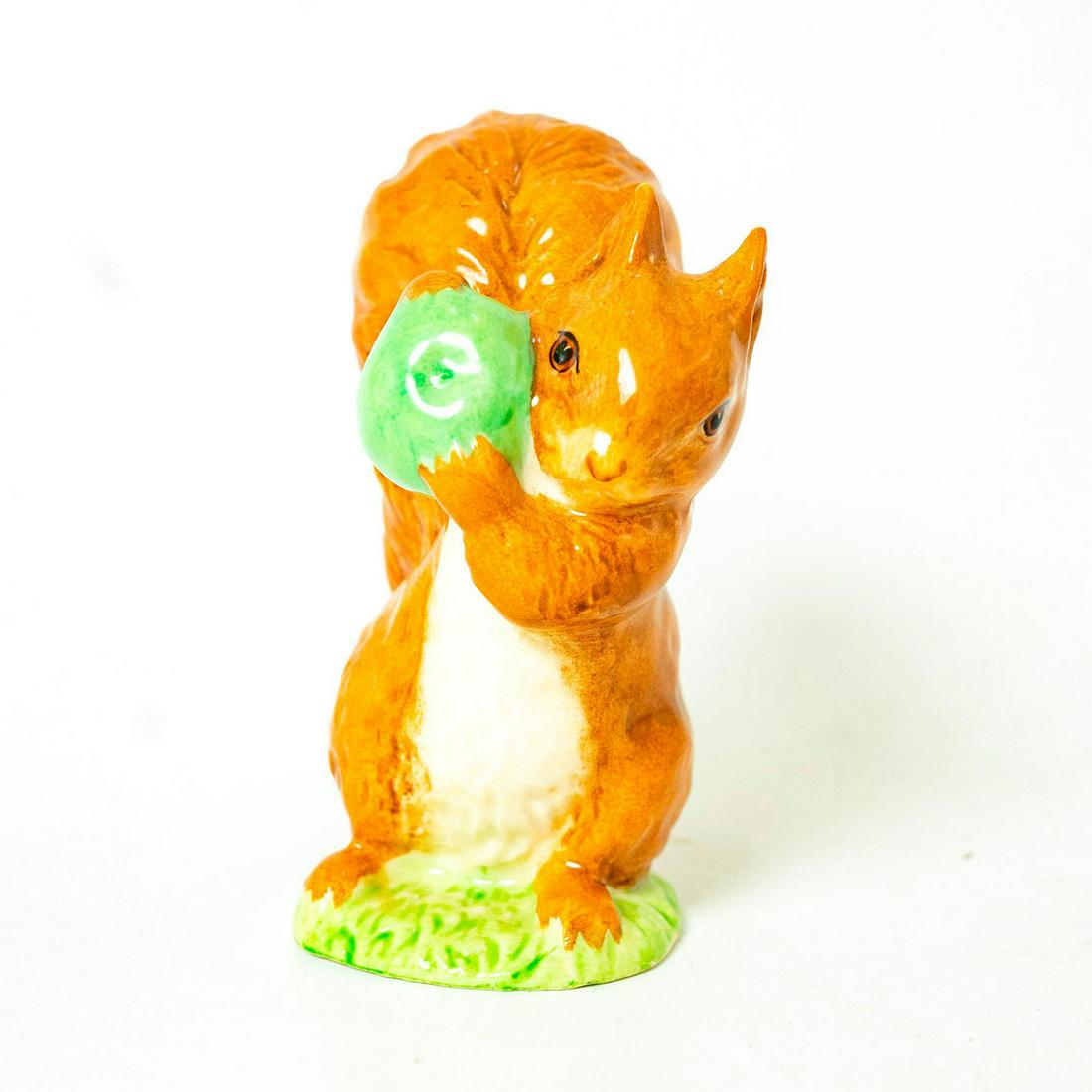 Squirrel Nutkin (GreenApple) - New Beswick - Beatrix: New Beswick Backstamp. Red-Brown squirrel, green apple. Artist: Arthur Gredington Dimensions: 3.75"H Manufacturer: Beswick Country of Origin: England