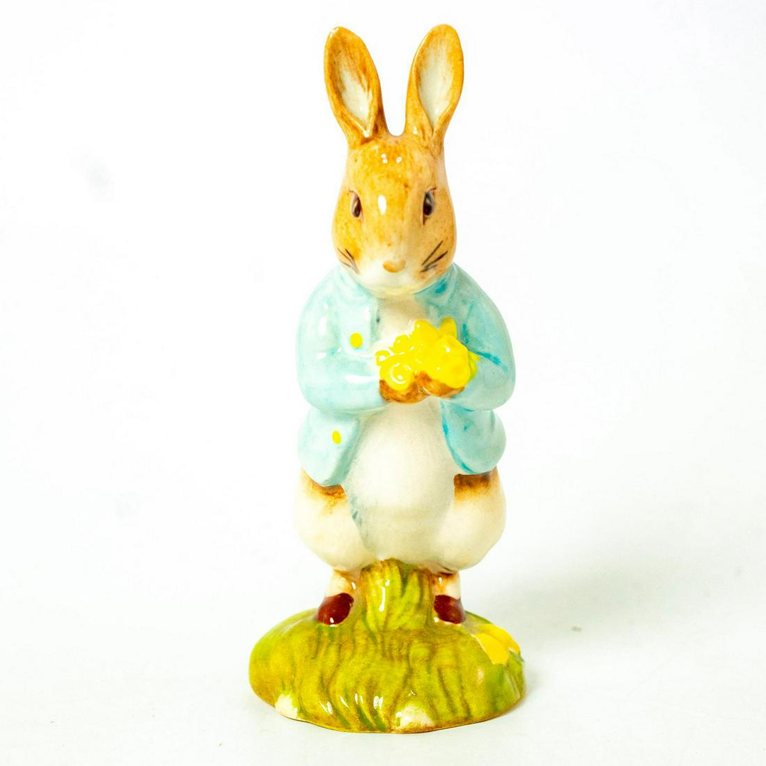 Peter with Daffodils - Beatrix Potter Figurine: Beswick Backstamp. Artist: Warren Platt Issued: 1996 - 1999 Dimensions: 4.75"H Manufacturer: Beswick Country of Origin: England