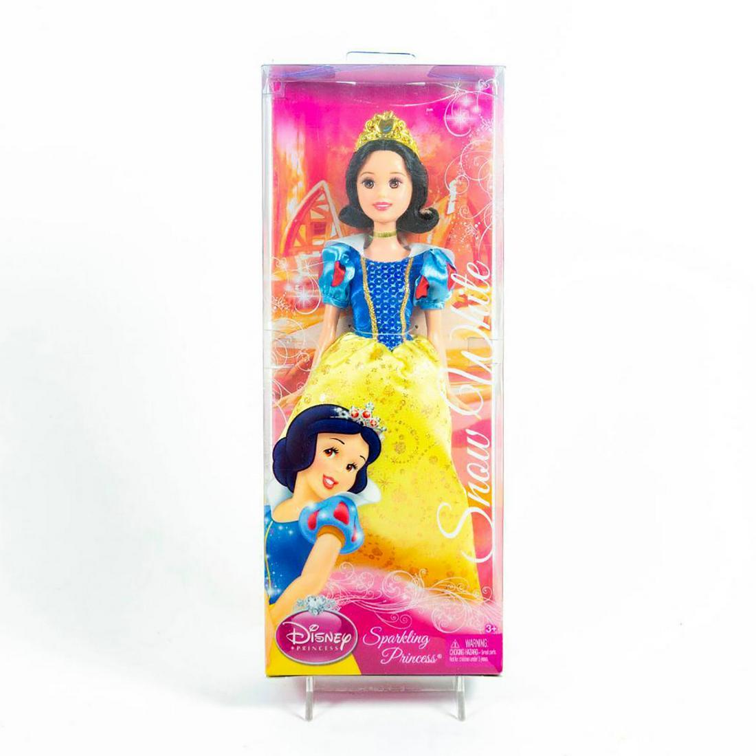 Barbie Doll, Snow White, Sparkling Princess: Snow White wears her iconic dress of yellow skirt, blue bodice with blue and red puff sleeves. SKU R4844. #barbie #snowwhite #disney Issued: 21st c. Dimensions: 12"H Manufacturer: Mattel Country of Or