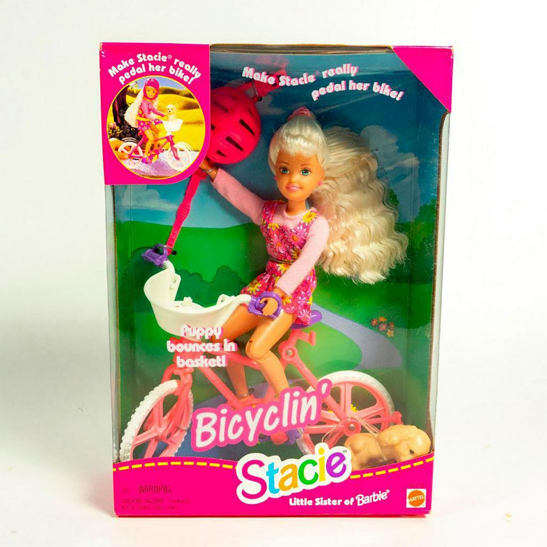 Bicyclin' Stacie, Little Sister of Barbie Doll: Barbie's young sister, Stacie: With pink and white bike; bike basket with dog inside. Helmet and brush included. With original box. SKU #16734. #barbiesister Issued: 1996 Dimensions: 8"H Manufacturer: