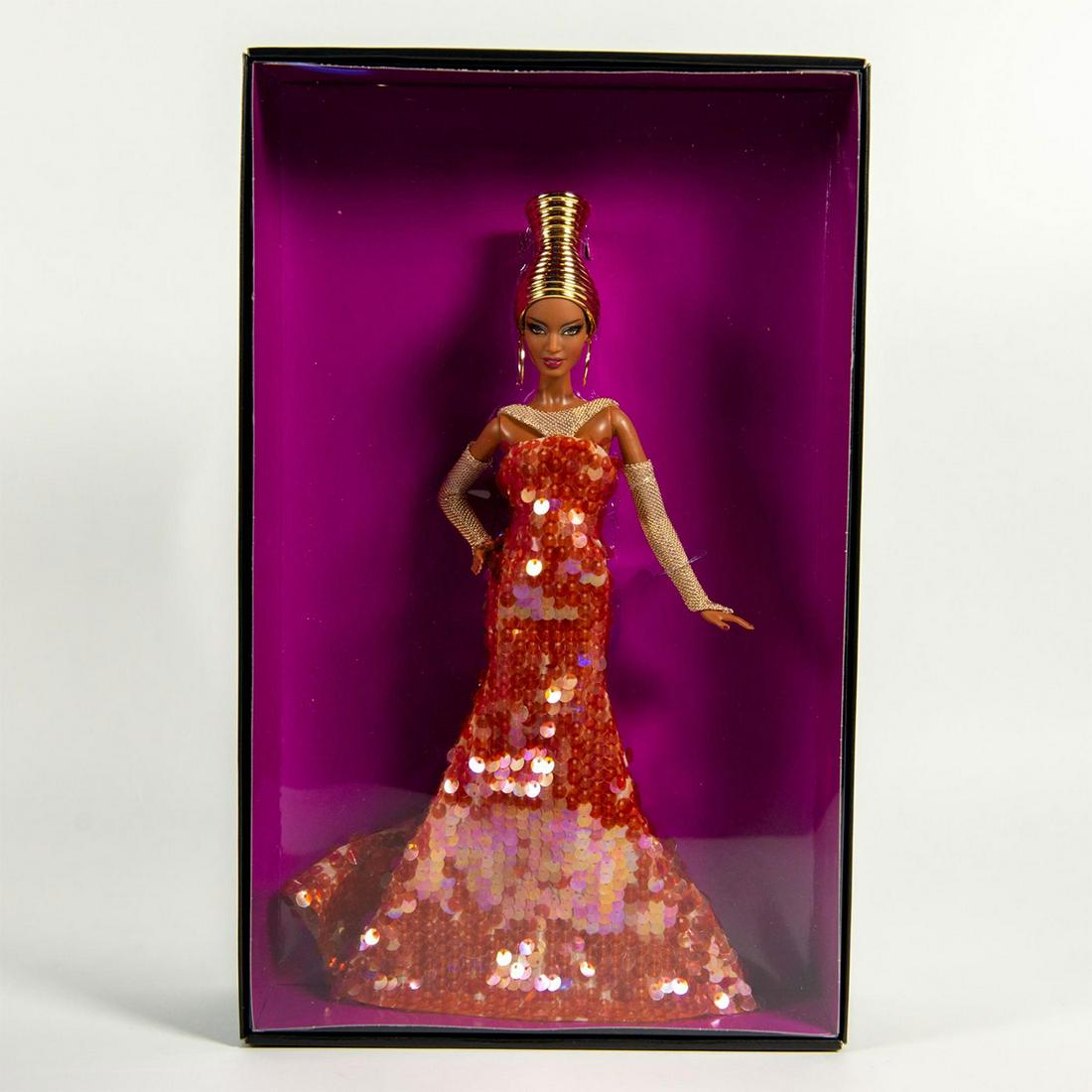 Mattel Barbie Doll Collector Stephen Burrows Alazne: Acclaimed designer Stephen Burrows presents Alazne Barbie, inspired by Versailles, bling, glamour, and a touch of Africa. Includes original box. No more than 6,200 produced worldwide. SKU #X8279. Arti