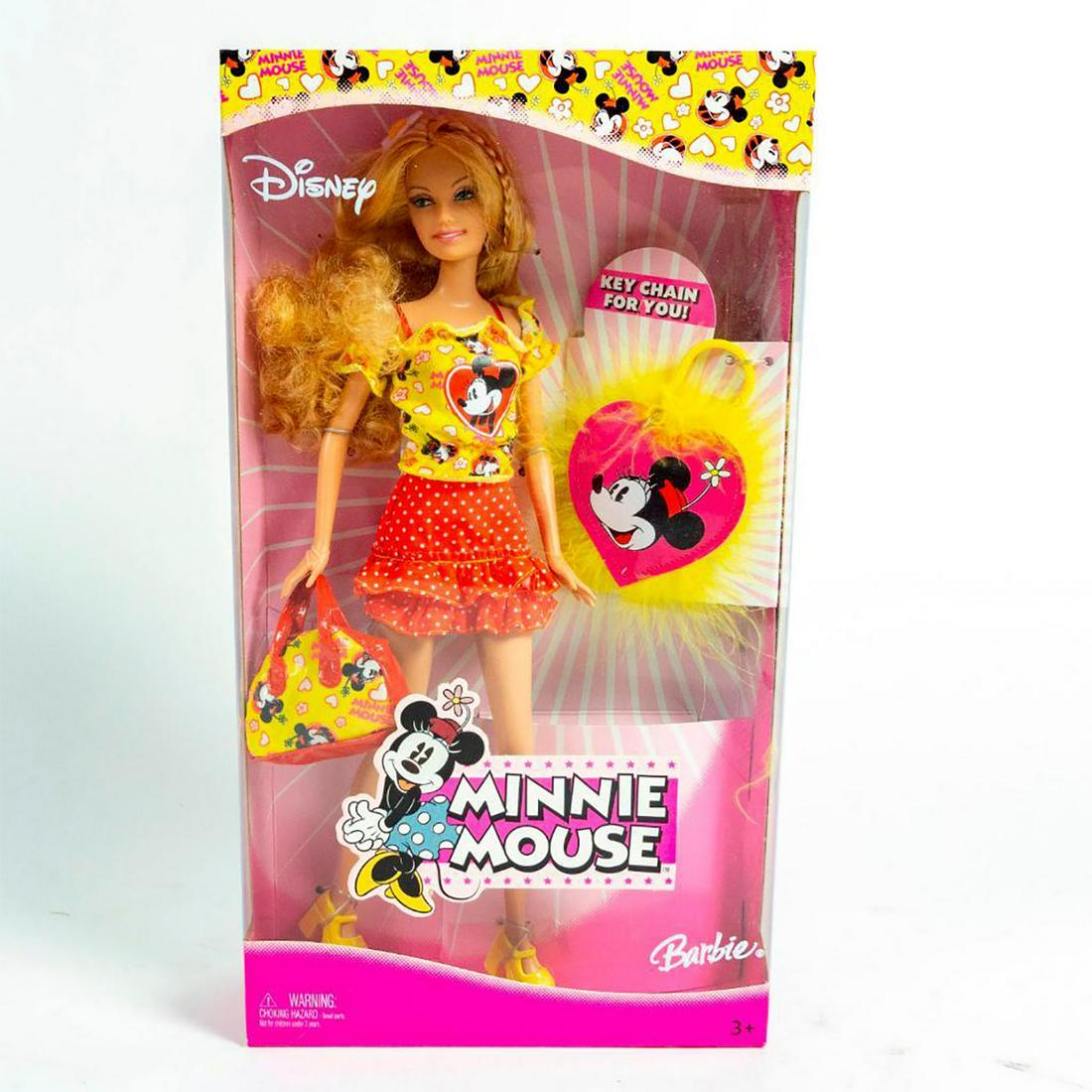 Mattel Disney's Minnie Mouse Barbie Doll: Barbie doll dressed in Minnie Mouse outfit, Minnie Mouse accessories. With keychain. SKU #J0873. With original box. Issued: 2005 Dimensions: 12.75"H Manufacturer: Mattel Country of Origin: Indonesia