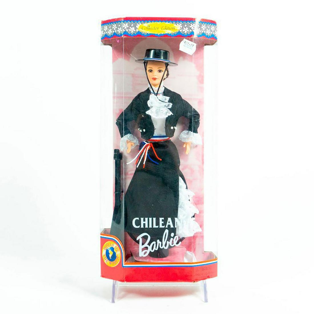 Mattel, Dolls Of The World; Chilean Barbie Doll: Barbie dressed in traditional Chilean attire; Black skirt and jacket with lace underneath. With original box. SKU #18559. Issued: 1997 Dimensions: 13"H Manufacturer: Mattel Country of Origin: China