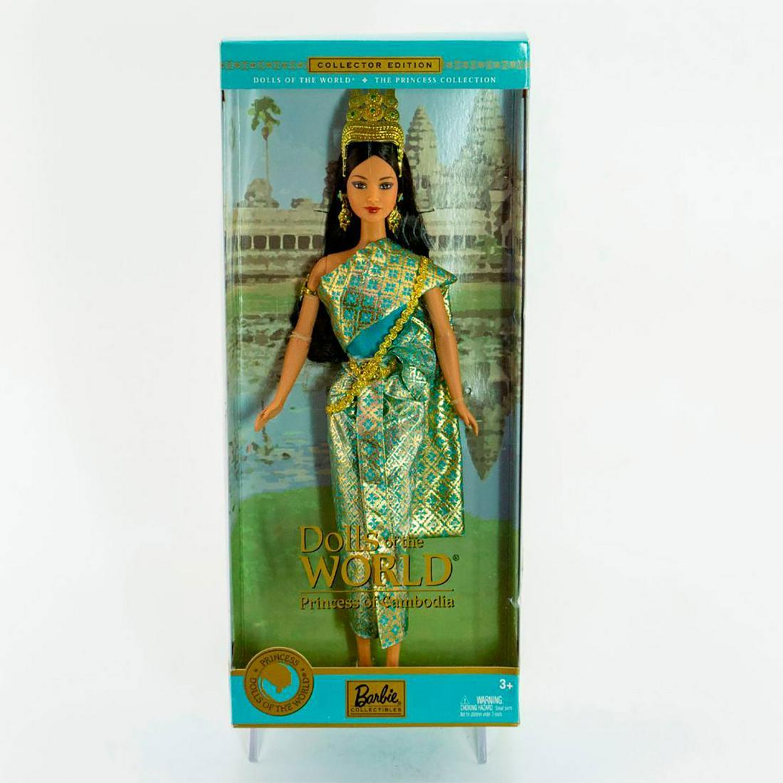 Mattel, Dolls Of The World; Princess Of Cambodia: Barbie dressed in traditional Cambodian attire; Beautiful, gold and teal dress. Gold headpiece, earrings and shoes. With original box. SKU #B3460. #barbie Issued: 2003 Dimensions: 13"H Manufacturer: M
