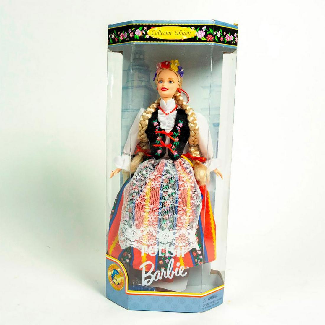Polish Barbie Doll: Barbie dressed in traditional Polish attire; Hair braided; Brush included. With original box. SKU #18560. Issued: 1997 Dimensions: 11"H Manufacturer: Mattel Country of Origin: China