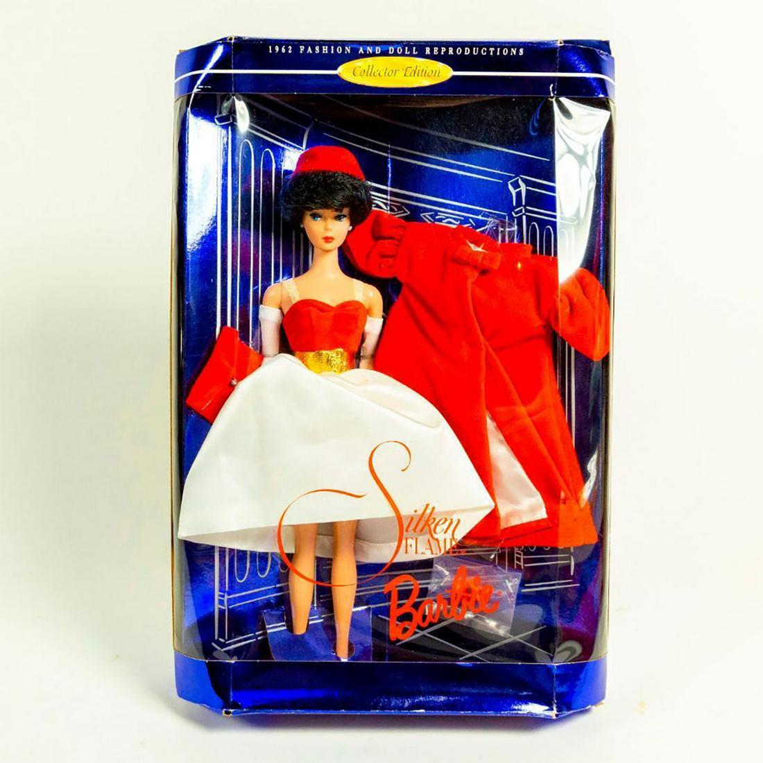 Silken Flame Barbie Doll: Barbie dressed in all red and white dress; red coat and red shoes. With Original Box. SKU #18448 Issued: 1997 Dimensions: 11"H Manufacturer: Mattel Country of Origin: Malaysia