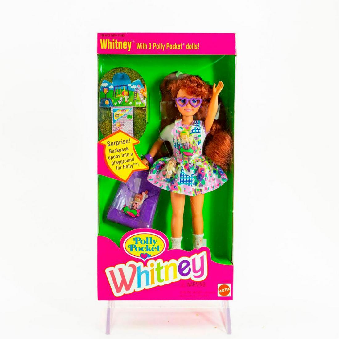 Mattel Whitney Doll, Polly Pocket Whitney: Whitney wears a fun, spunky outfit holding a Polly Pocket backpack. SKU #12983. Issued: 20th c. Dimensions: 7.5"H Manufacturer: Mattel Country of Origin: Malaysia