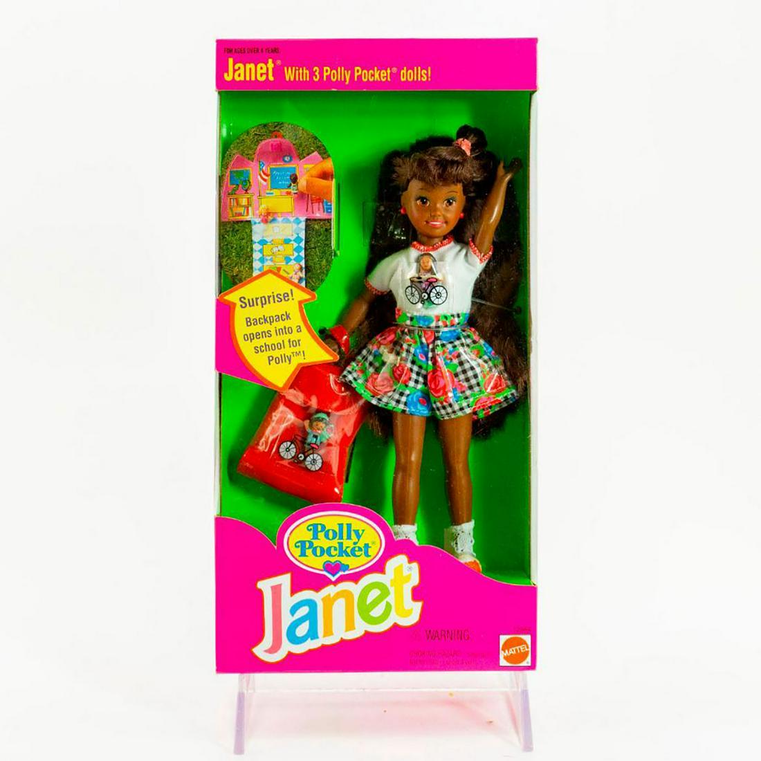 Mattel Janet Doll, Polly Pocket Janet: Happy Janet wears a vibrant outfit with a Polly Pocket backpack. SKU #12984. Issued: 20th c. Dimensions: 7.5"H Manufacturer: Mattel Country of Origin: Malaysia