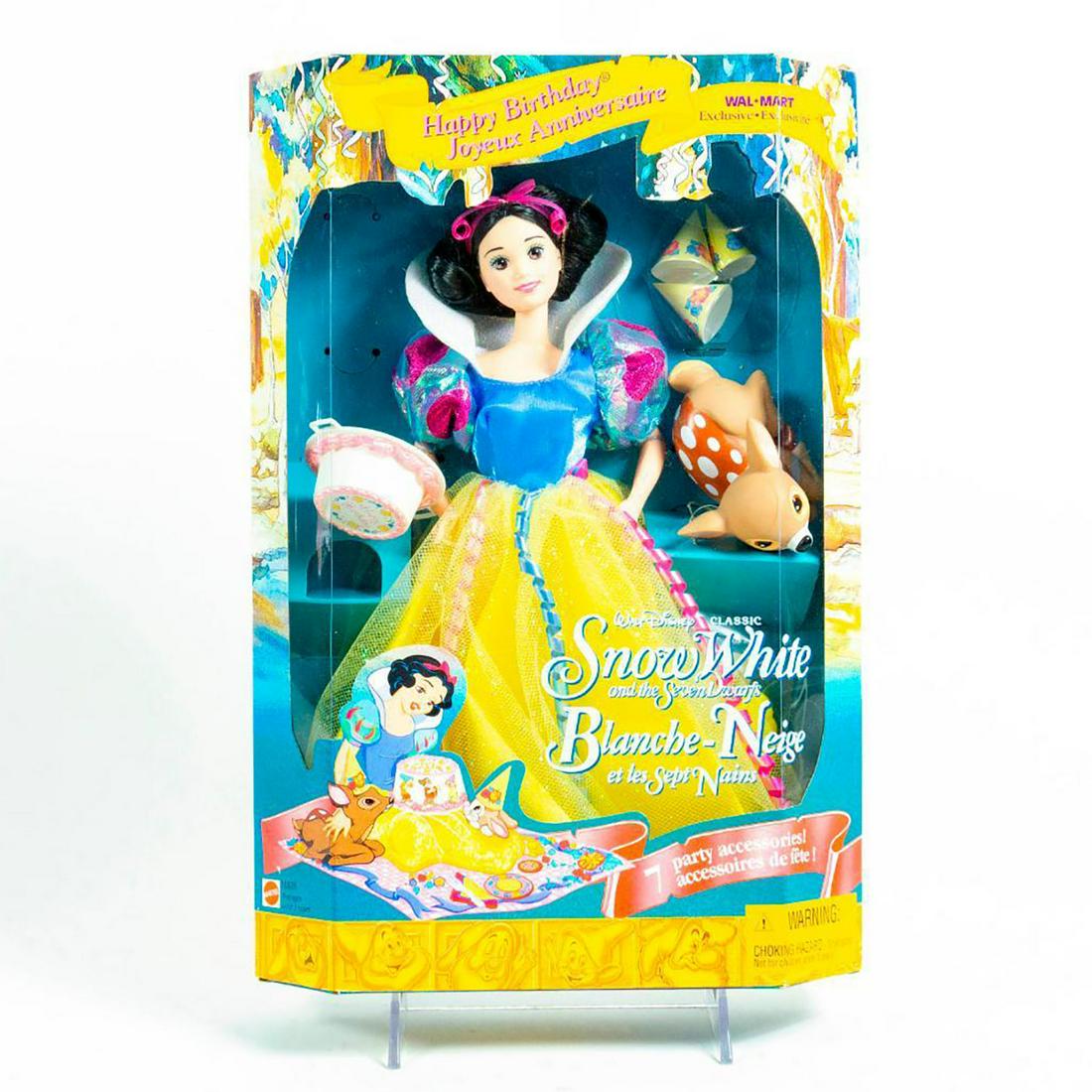 Mattel, Disney's Snow White From The Seven Dwarfs Doll: Snow White in traditional blue and yellow dress. Two animal friends, birthday cake, and hats. With original box. SKU #16535. Issued: 1996 Dimensions: 13"H Manufacturer: Mattel Country of Origin: Malay