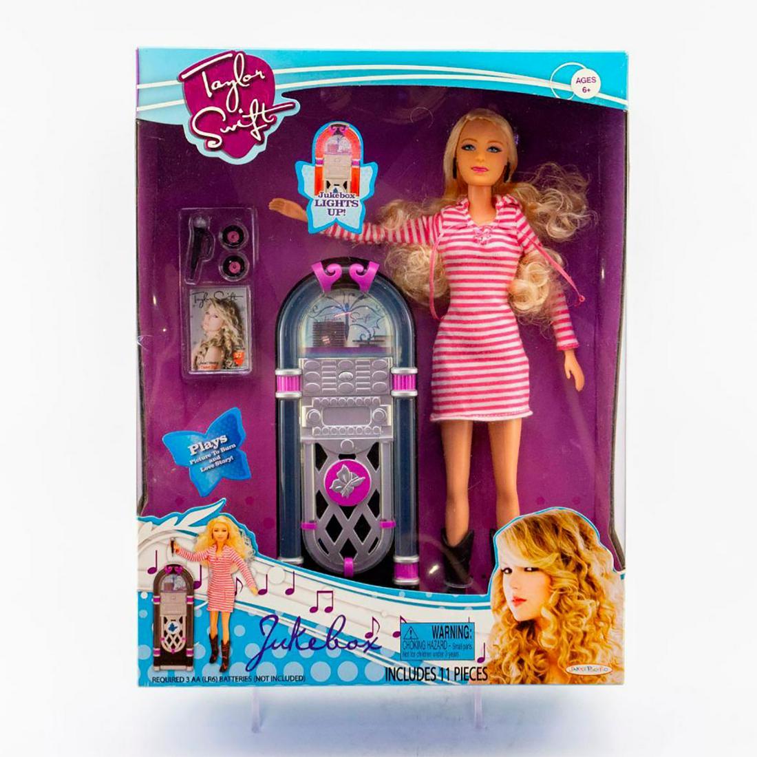 Jakks Pacific Doll, Taylor Swift with Jukebox: Collectors keepsake in original box. SKU #21095. Issued: c. 2010 Dimensions: 13"H Manufacturer: Jakks Pacific Country of Origin: China