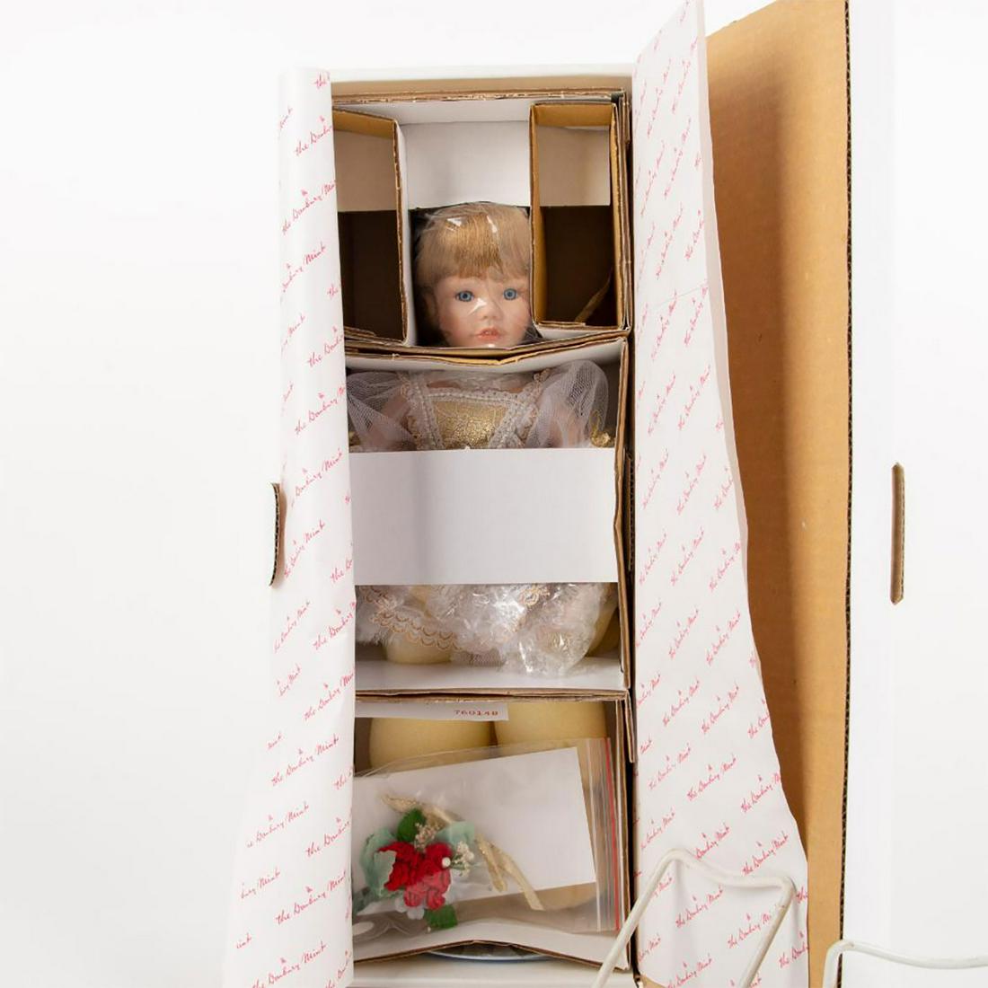 Danbury Mint Julia Doll: Julia Doll in gold and white mesh ballerina dress. With original box. Artist: Susan Wakeen Issued: 1992 Dimensions: 18"L Country of Origin: Taiwan