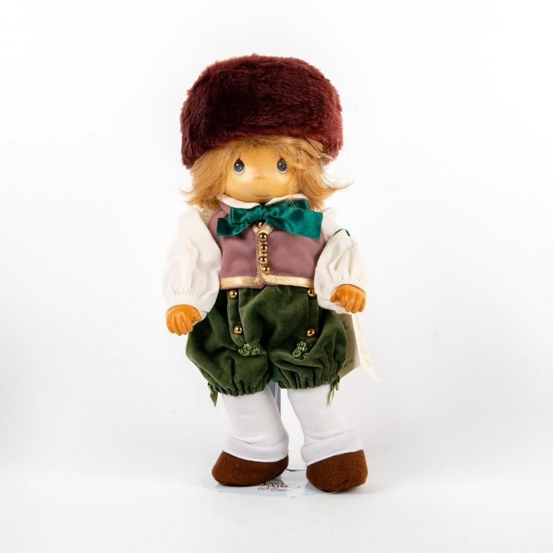 Precious Moments Collectible Doll, Fredrick 1219: Exquisite limited edition hand crafted wooden doll; rich detail. Includes name tag. Features 13" doll and doll stand. Housed in original box; wear to box. Issued: 1995 Dimensions: 15.75"H Manufacturer