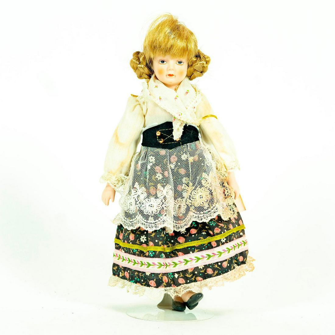 Vintage Doll, Gorham, Pretty Marla: Collectible doll in floral pattered dress with heavy belt, lace apron, and patterned bandana. Original label attached to back. Original warning label attached to back. Original tag under dress. Attach