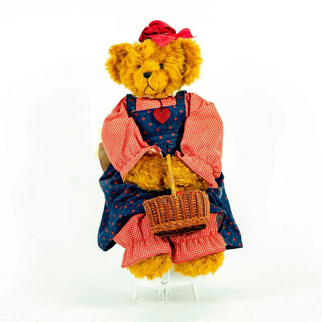 Applewood Lane Bears Teddy Bear, Apple Annie: Rag cloth body; mohair; polyester and pellet filled; glass eyes. Annie with basket of apples. Includes original tag. Loose apples. Issued: 20th c. Dimensions: 16"H Manufacturer: Applewood Lane Bears C