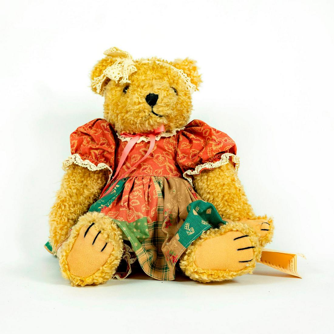 Bearly People Cheryl De Rose Teddy Bear: Articulated bear dressed in a floral dress and trousers; embroidered lace ribbon in hair. Includes original tag. Artist: Cheryl De Rose Issued: 1995 Dimensions: 15.5"H Country of Origin: United States