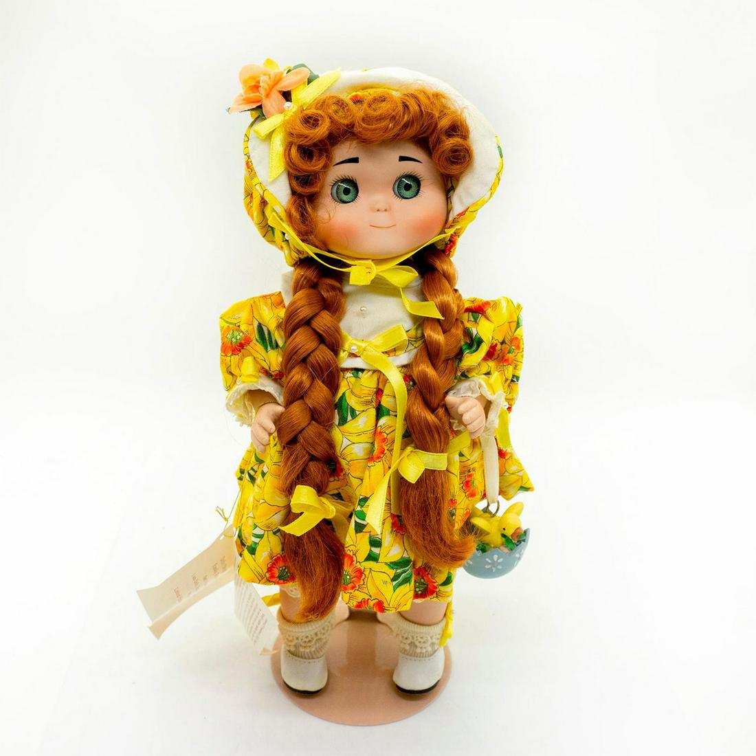 Goebel, Dolly Dingle Daffy Dumpling Porcelain Doll: Limited edition 218 of 500. Daffy is wearing a bright yellow daffodil print dress and bonnet. Holding a egg and chick ornament. Comes with original box, tags and certificate of authenticity. #porcelai