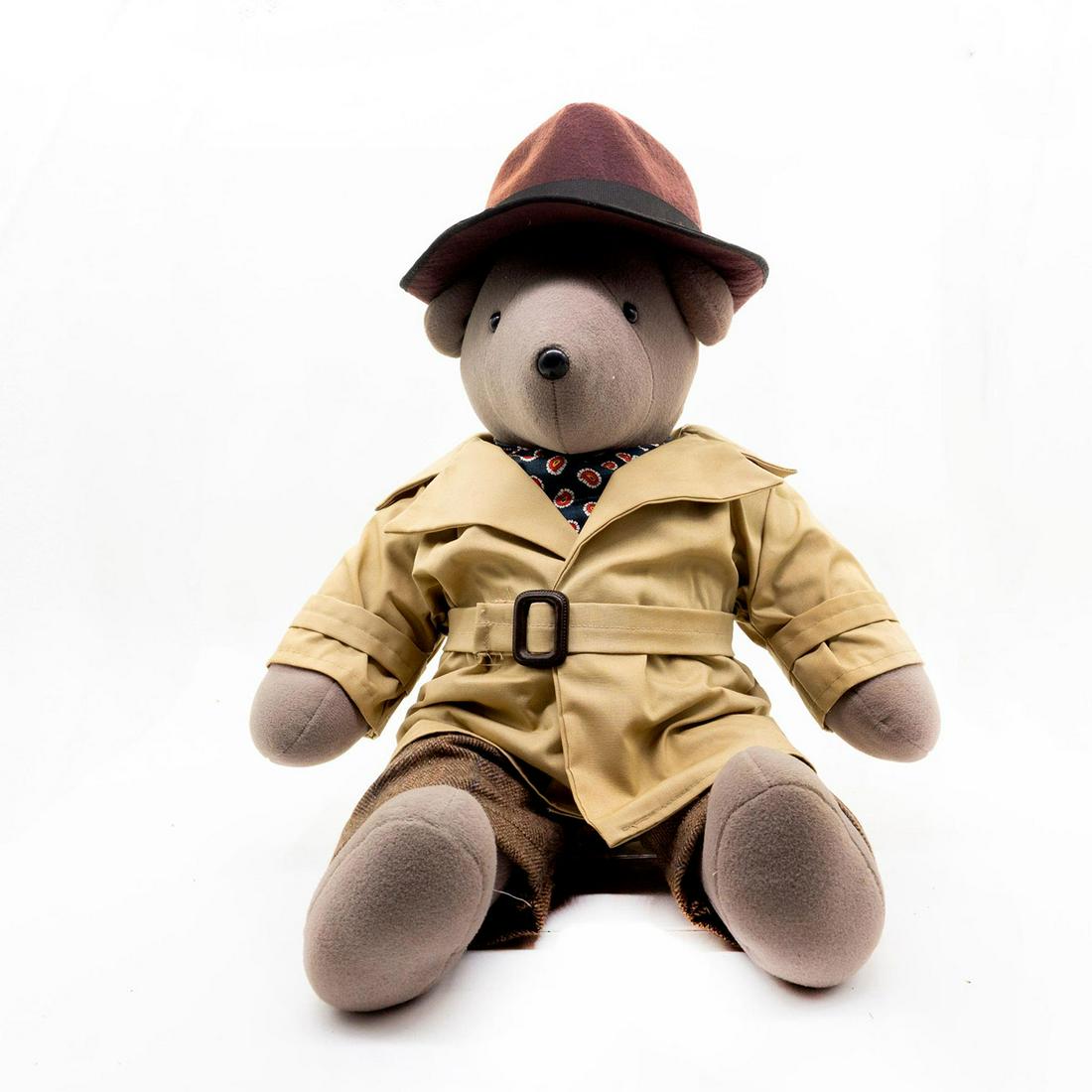 North American Bear Company Teddy Bear, Humphrey: Gray plush, wearing a detective's outfit with a paisley dotted tie, original tag included. In the TV Show, Full House, Stephanie Tanner, had a bear like this that she named Mr. Bear. Issued: 1983 Dime