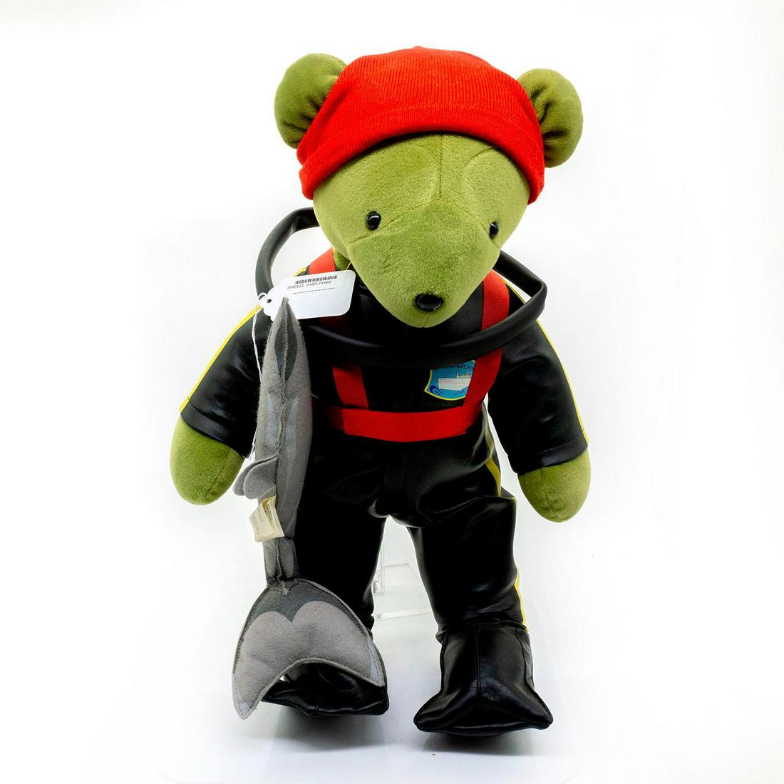 North American Bear Company Teddy Bear, Jacques: Plush, wearing a diving suit and carrying a dolphin plush. Original tag attached. Issued: 20th c. Dimensions: 20"H Manufacturer: North American Bear Company Country of Origin: United States