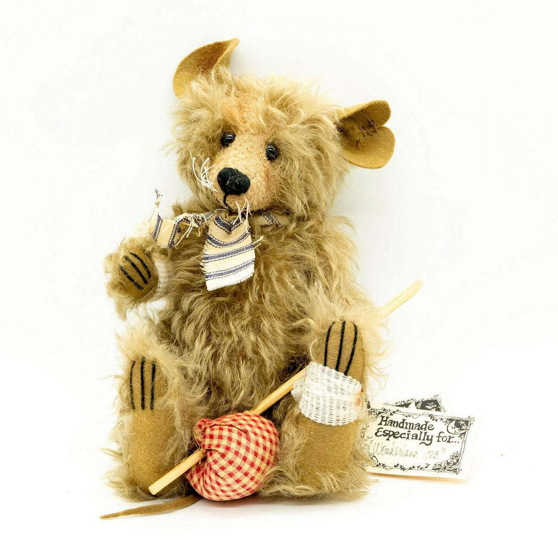 Penny Noble, Cagney Rat Handcrafter Plush Doll: Limited Edition 4 of 50. Cagney aka Your Dirty Rat! is wearing a white and blue striped ribbon and carrying a red and white gingham bidle sack. Comes with original tags. Body tag has been signed by Pe