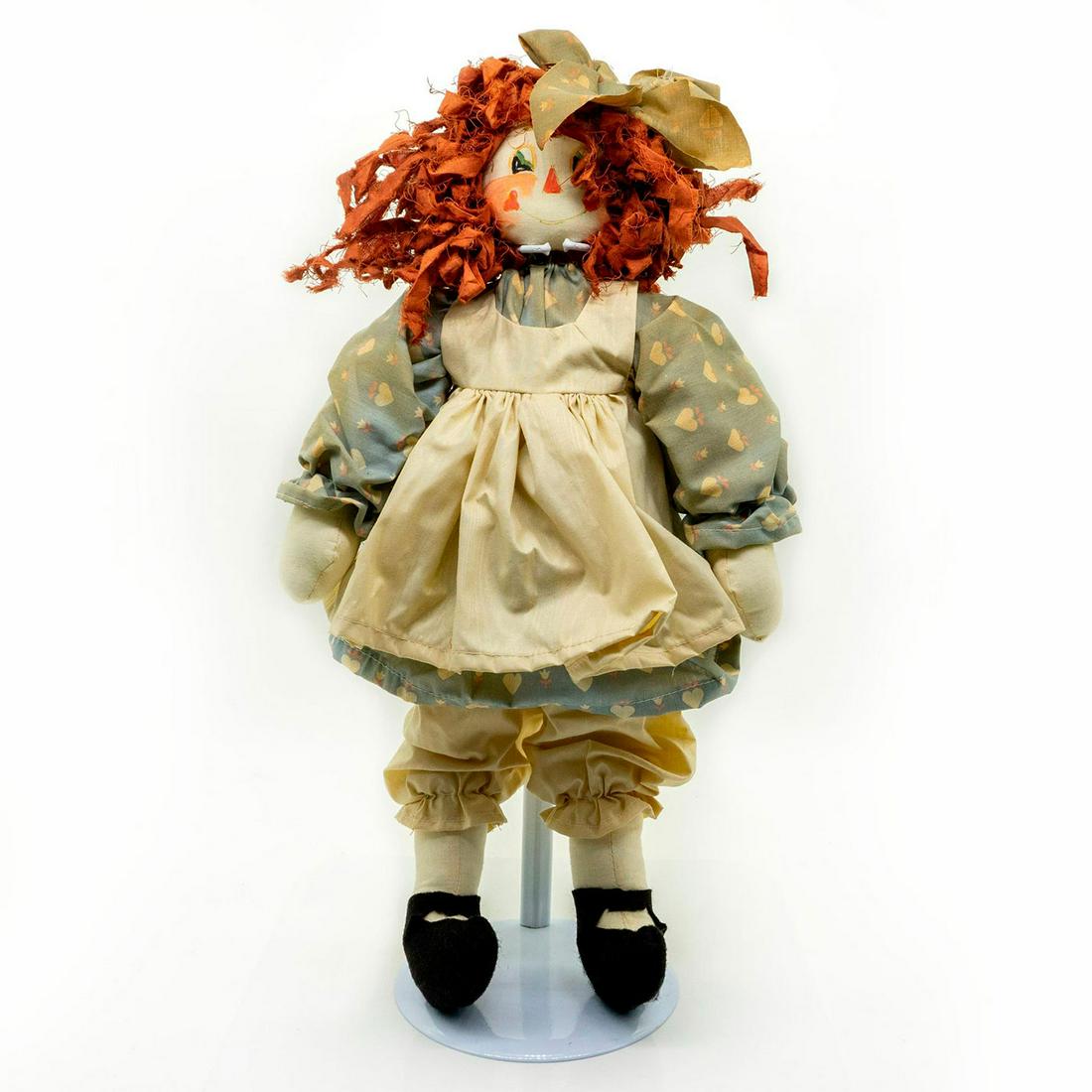Vintage Cloth Doll, Raggedy Ann: In style of Raggedy Ann. Cloth body, wearing blue shirt decorated with hearts and white apron. Minor wear, stains, and fading. Issued: 20th c. Dimensions: 18"H