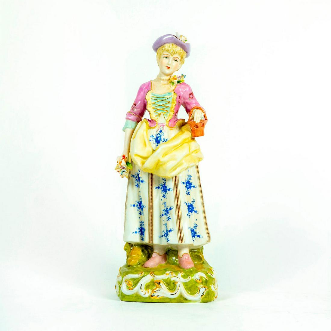 Meissen Style Porcelain Figurine Woman With Flowers: Woman with multicolored floral dress holding a bunch of flowers and a basket in her hands. Purple, pink, yellow green and blue dress with gilded trim. Crossed swords over capital R backstamp. Dimensio