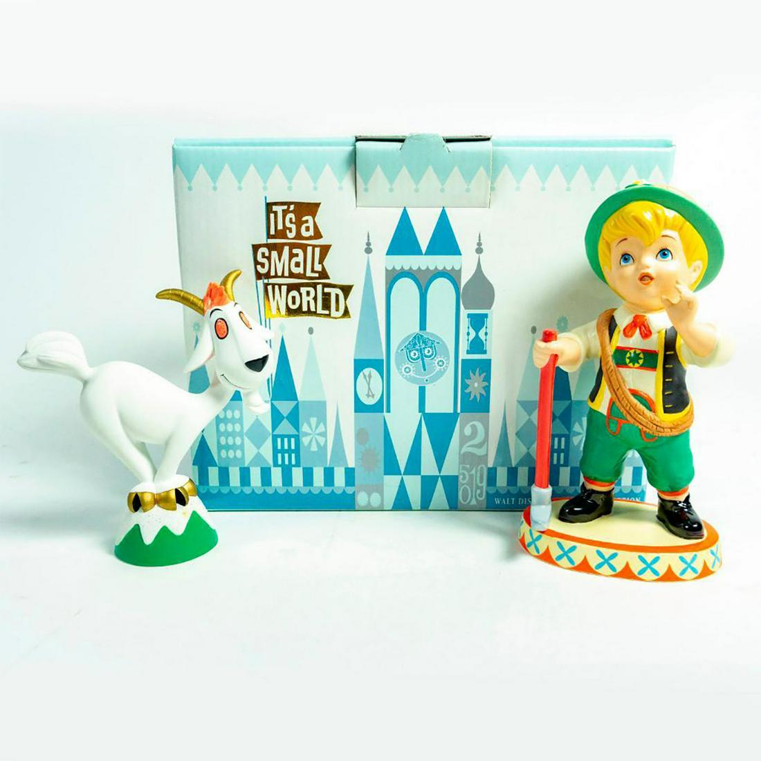 Disneys Its A Small World After All Alpine Climber: Resin figurines; Young Swiss boy in green, red and white. White goat on green and white stand. With box. Issued: c. 1990s Dimensions: 6" tallest Manufacturer: Disney Country of Origin: Thailand