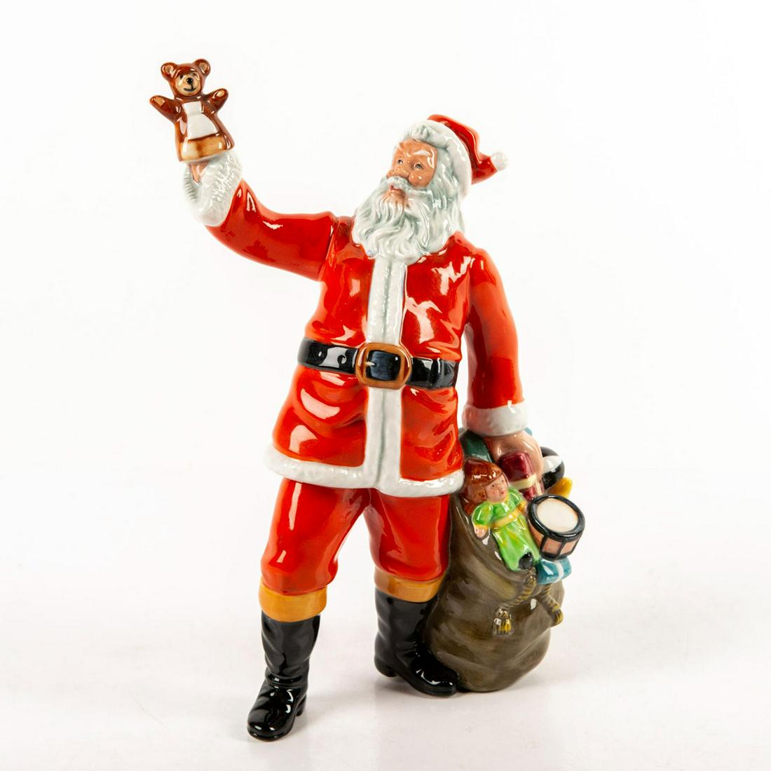 Santa Claus HN2725 - Royal Doulton Figurine: Santa Series. Glazed porcelain; red and white coloration. Santa with toys. Doulton backstamp. Artist: William K Harper Issued: 1982-1993 Dimensions: 10.25"H Manufacturer: Royal Doulton Country of Orig