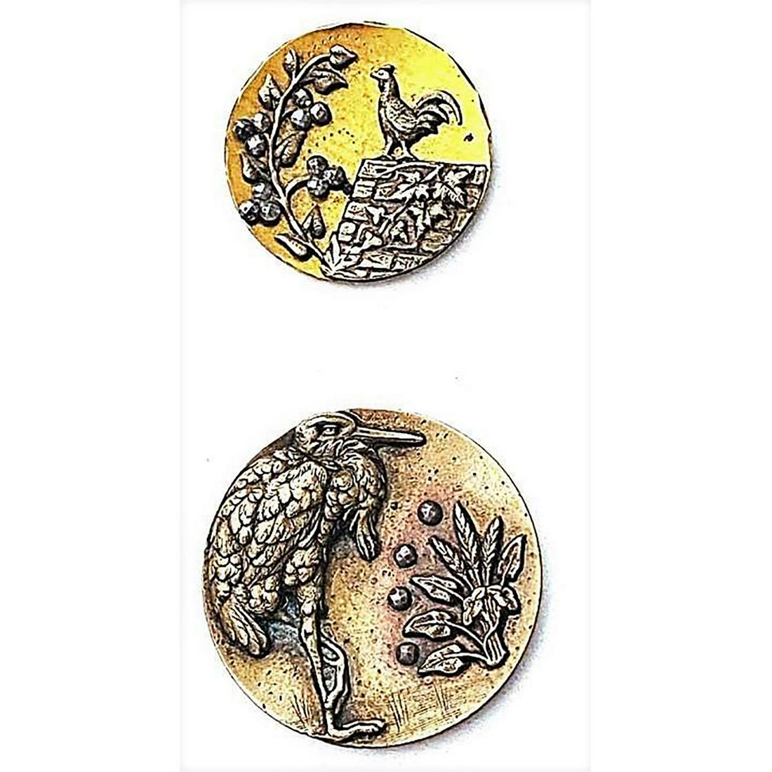 A SMALL CARD OF BRASS BIRD BUTTONS (1 of 4)