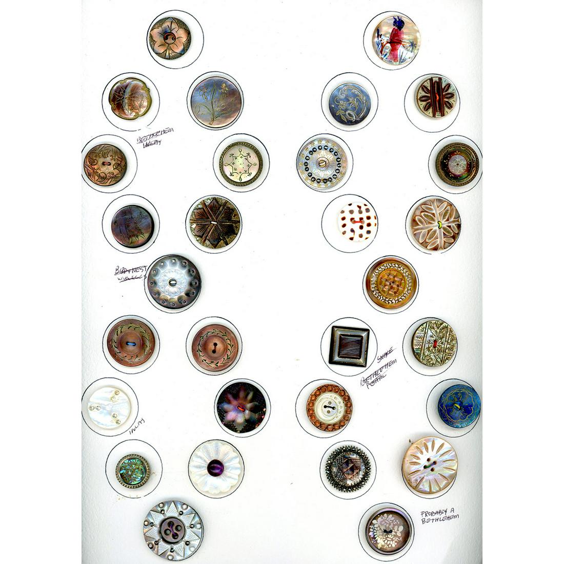 A CARD OF DIVISION ONE CARVED SHELL BUTTONS (1 of 4)