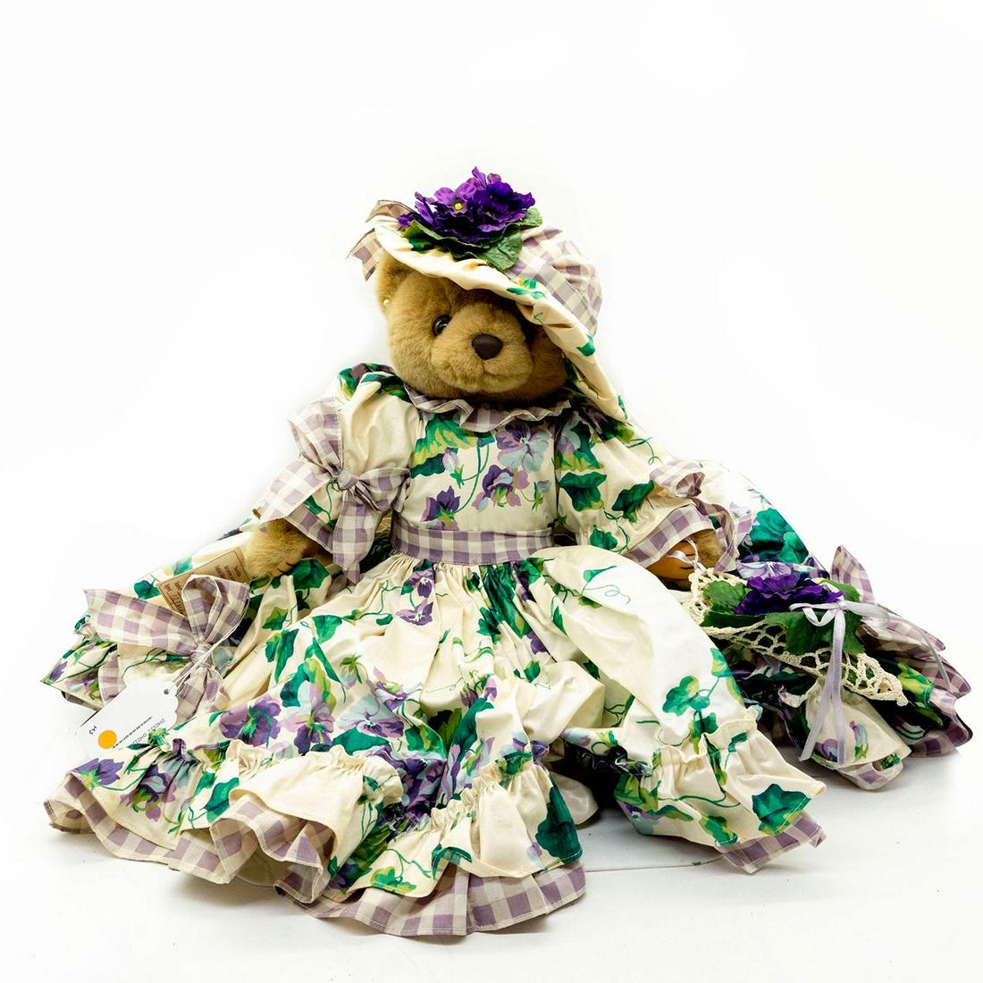 Bearly People Teddy Bear. Violet's Garden: Fully jointed, light brown bear. Brown nose and eyes. Large, purple and green flowing dress and hat. Manufacture tag. Artist: Cheryl De Rose Issued: 1994 Dimensions: 24"H Manufacturer: Bearly People C
