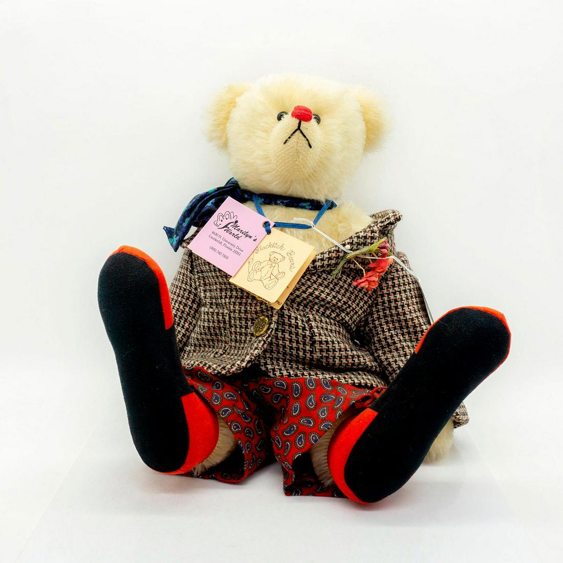 Blacklick Teddy Bear, Clarence: Fully jointed, mohair, shaved snout, sewn nose. Wearing a knitted jacket and paisley pants with some clown shoes. Original tag attached. #clown #paisley #teddybear Artist: Jackie Morris Issued: c. 198