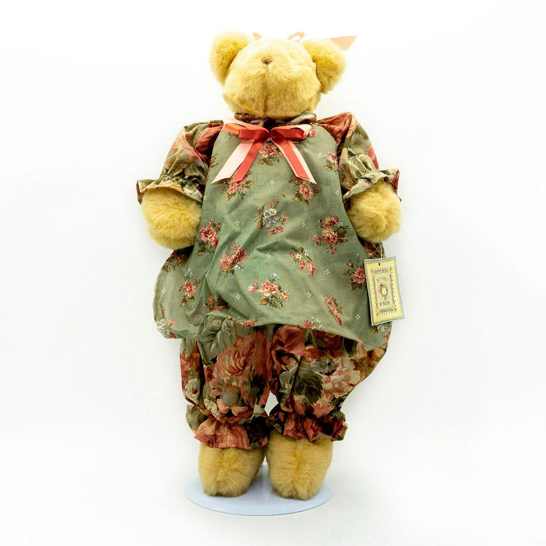 Bunnies By The Bay Collectable Teddy Bear, Mallory: Glass eyes and stitched nose. Wears green and pink pajamas, decorated with pink and red ribbons. Manufacturer tag attached. Excellent condition. Artist: Lucy Issued: 1986 Dimensions: 18"H Manufacturer
