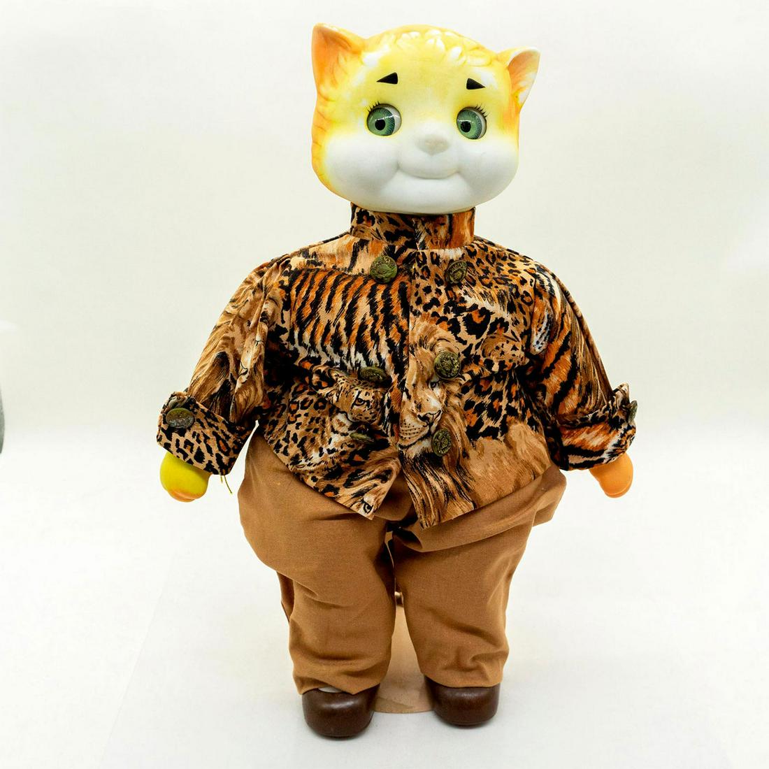 Dolly Dingle's, Cheetah Snooks Music Box Ceramic Doll: Limited edition 91 of 500. Music box plays - Corn Free -. Ceramic face, arms and legs. Metal doll stand included. #cat #porcelaindoll #bisquedoll #musicbox Artist: Bette Ball Issued: 1993 Dimensions: 