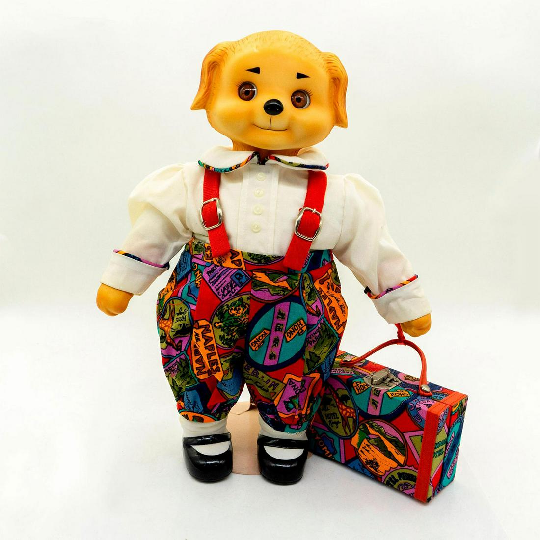 Dolly Dingle's, Wiggles Music Box Ceramic Doll: Limited edition 289 of 500. Style 911534. Music box plays - Around the World in Eighty Days -. Ceramic face, arms and legs. Doll is carrying a colorful suitcase. Metal doll stand included. #goldenretr