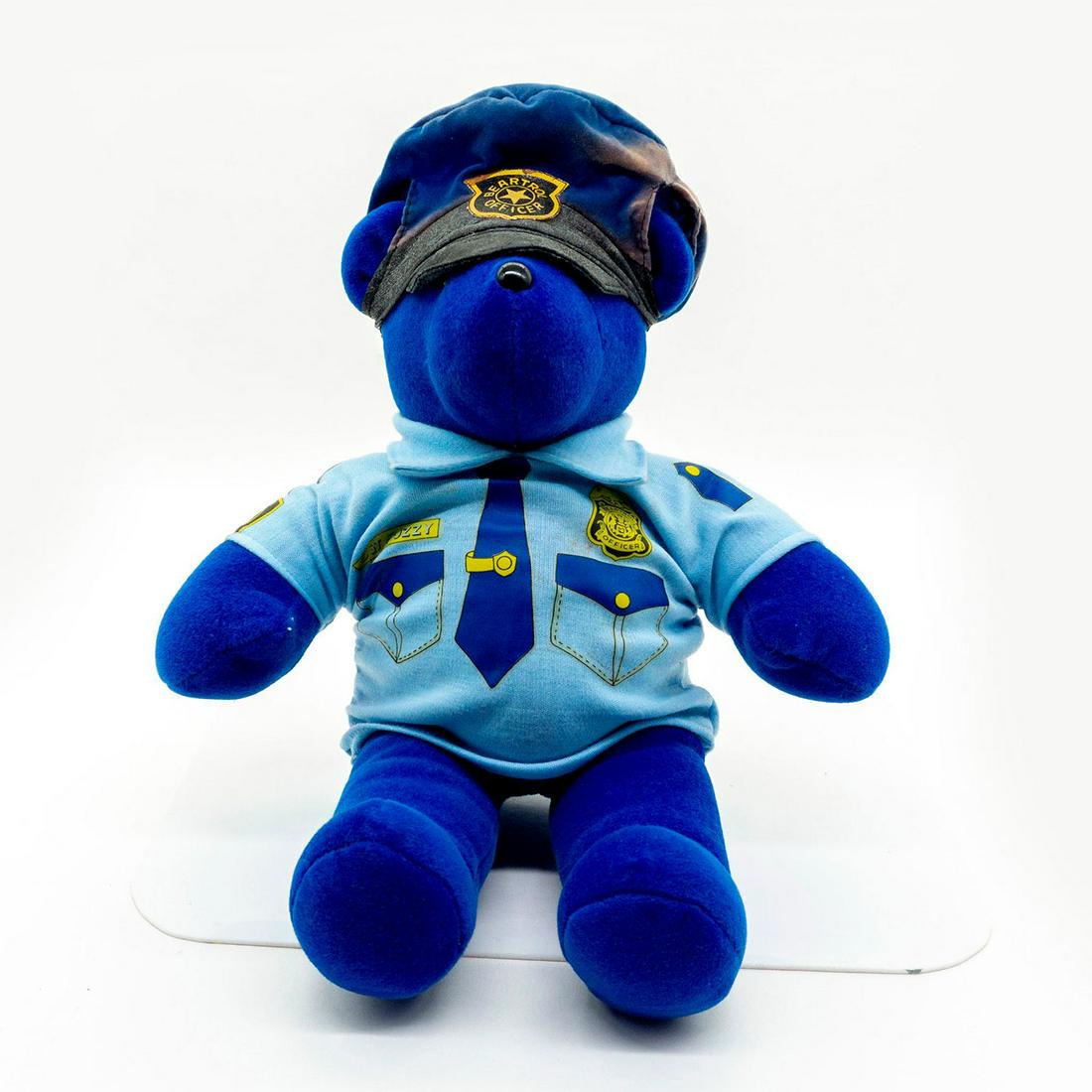 North American Bear Company Teddy Bear, Sgt Fuzzy: Plush, wearing a cop uniform. Original tag attached. DH0121435 Dimensions: 13"H Manufacturer: North American Bear Company Country of Origin: United States