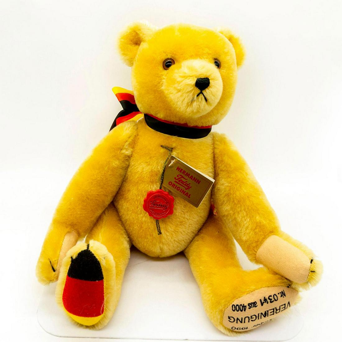 Hermann Teddy Original 1990 German Reunification Teddy: Limited edition 341 of 4,000. Comes with original tag with Hermann's signatures inside. Embroidered 3 Oktober, 1990 Vereinigung No. 0341 aus 4000 on the left paw pad. Right paw is German flag colorati