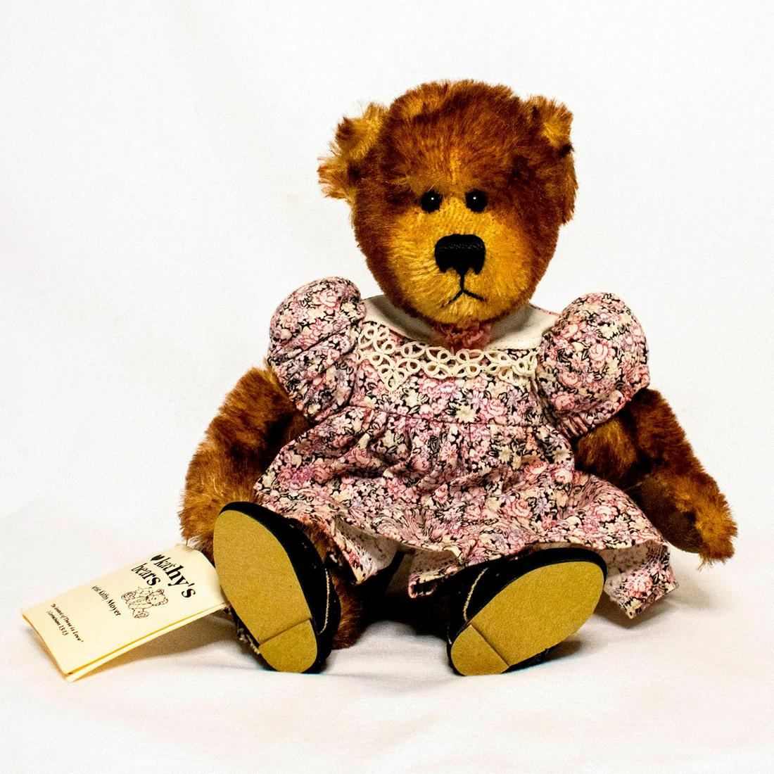 Kathy's Bears by Kathy Moyer, Kathy: Kathy wears a floral printed dress with an antique lace trim and black suede mary-jane slippers. One-of-a-kind design by Kathy Moyer. Original signed tag on the right hand. Tipped mohair. German glass