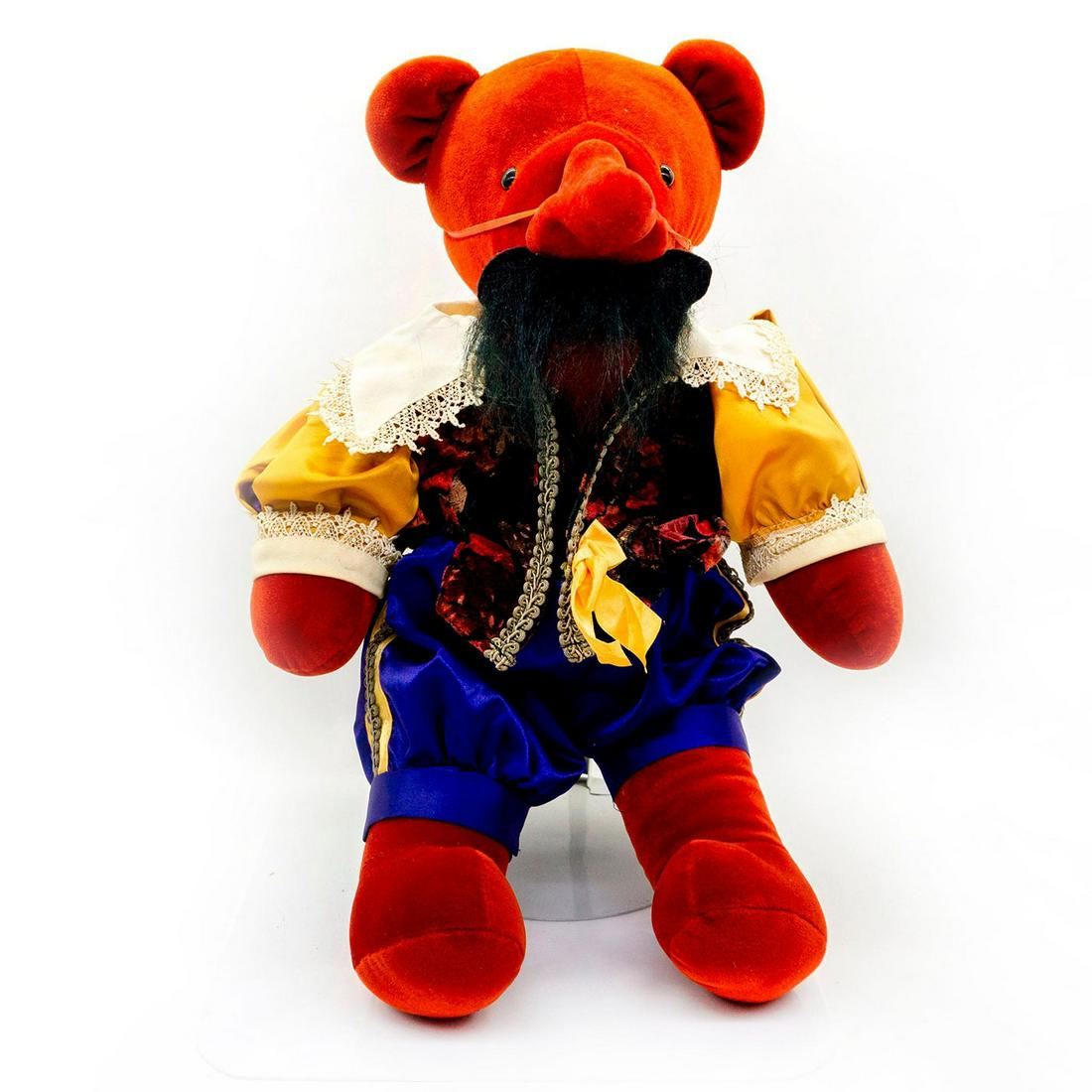 North American Bear Company Teddy Bear, Cyrano de: Plush, wearing a swordsman uniform and comes complete with a nose attachment. Missing hat. Original tag attached. Issued: 20th c. Dimensions: 20"H Manufacturer: North American Bear Company Country of 