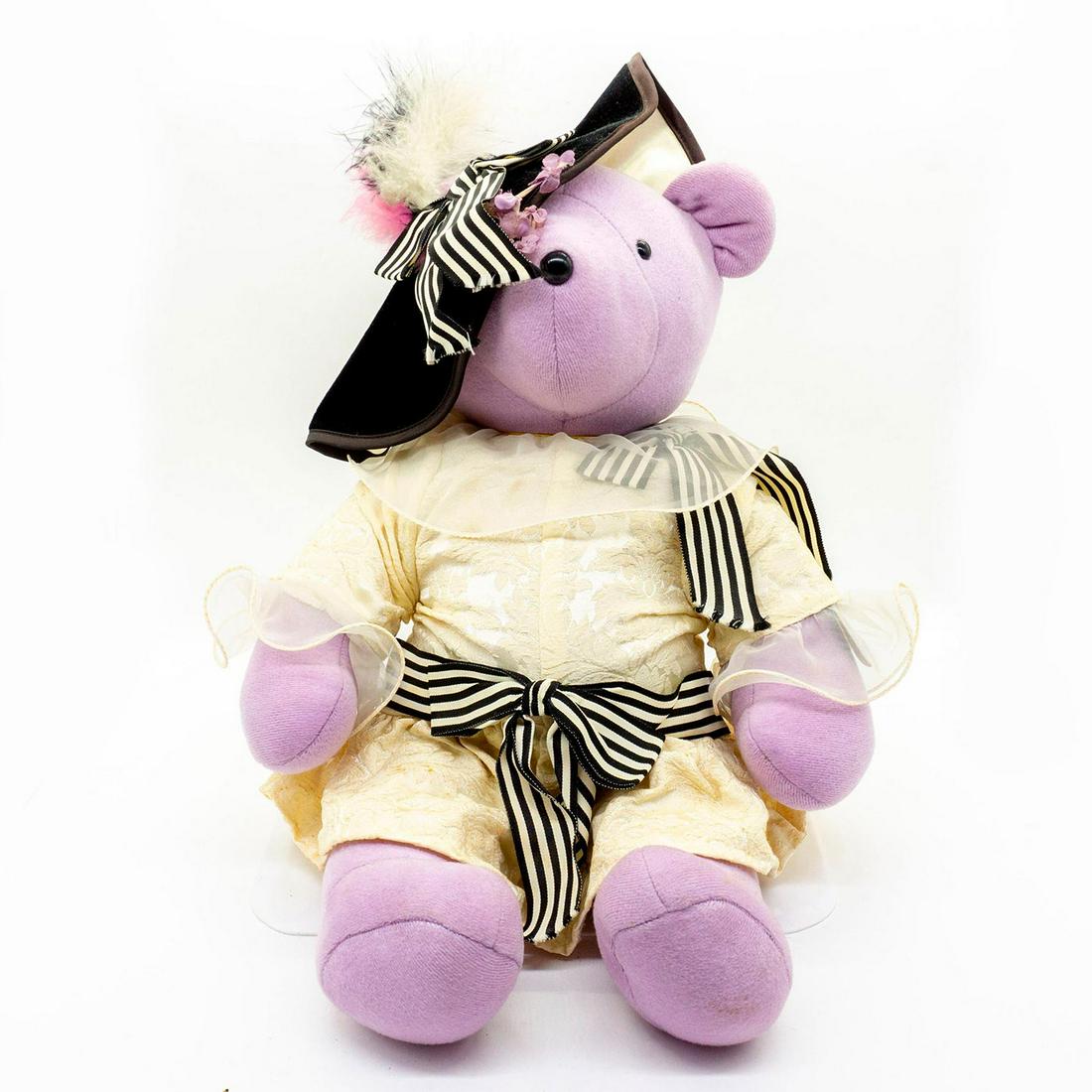 North American Bear Company, Audrey Hepbearn as My Bear: Plush teddy bear, wearing a beautiful white dress with collars and a black hat. Original tag attached. Issued: 20th c. Dimensions: 21"H Manufacturer: North American Bear Company Country of Origin: Uni